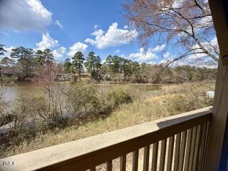 3071 Huntleigh Drive, Unit 3071 Raleigh, NC 27604 - Photo 21 of 25 a view of a lake from a balcony