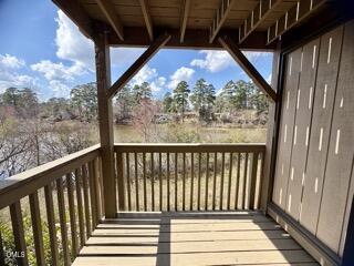 3071 Huntleigh Drive, Unit 3071 Raleigh, NC 27604 - Photo 22 of 25 a view of a balcony with wooden floor
