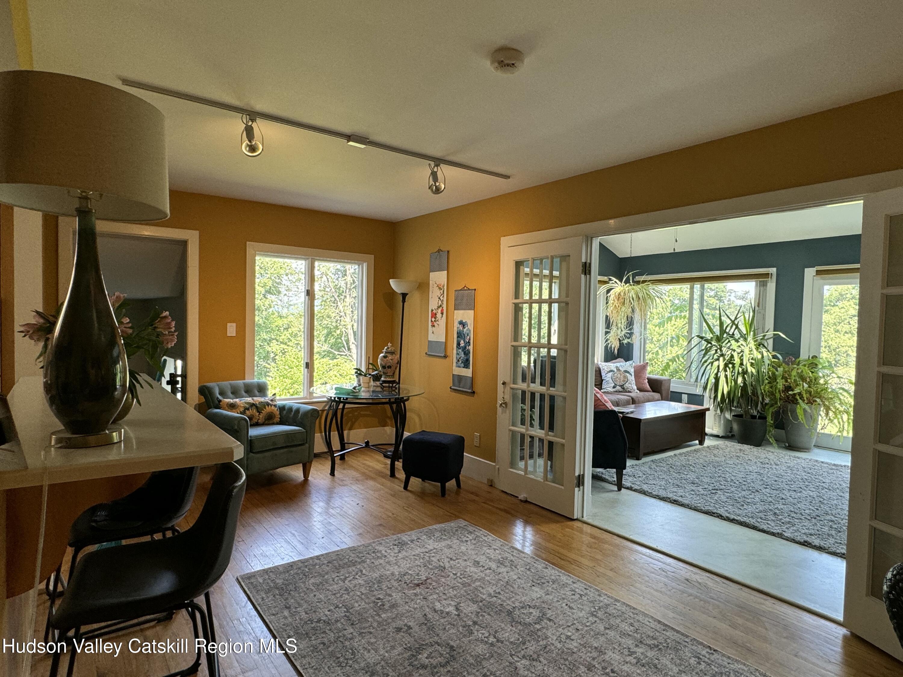 1476 County Rte 5 Canaan, NY 12029 - Photo 13 of 38 a living room with furniture and a large window
