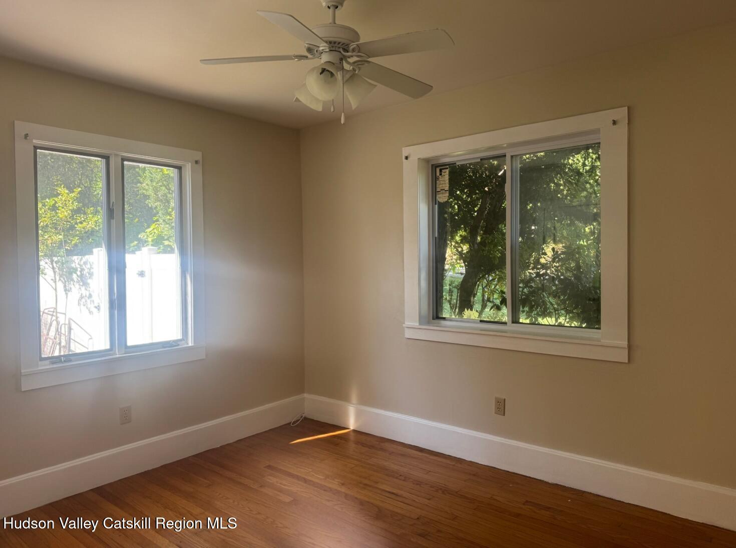 1476 County Rte 5 Canaan, NY 12029 - Photo 22 of 40 a view of an empty room with wooden floor and a window