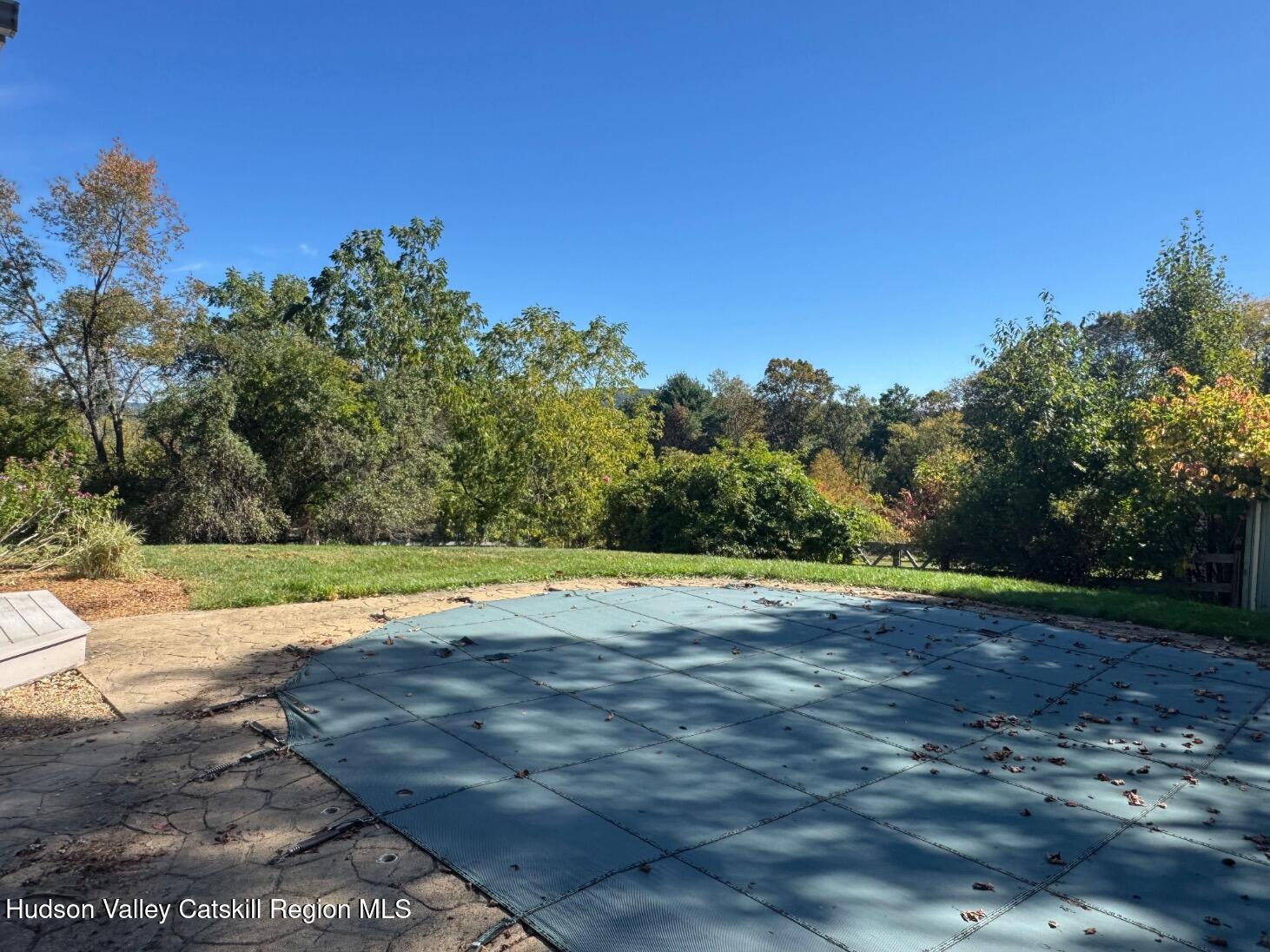1476 County Rte 5 Canaan, NY 12029 - Photo 28 of 40 a view of a swimming pool with an outdoor space and seating area
