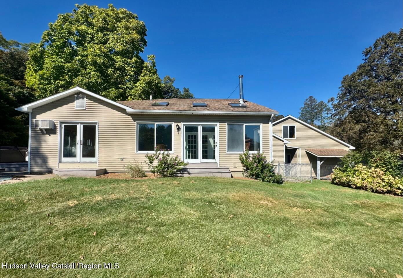 1476 County Rte 5 Canaan, NY 12029 - Photo 36 of 38 a front view of a house with a yard