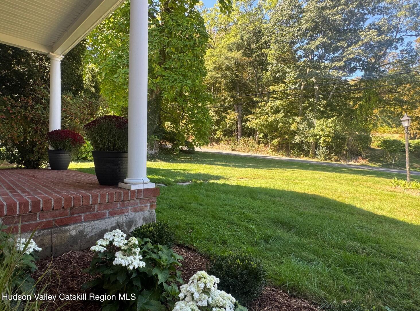 1476 County Rte 5 Canaan, NY 12029 - Photo 38 of 38 a view of a garden with a fountain