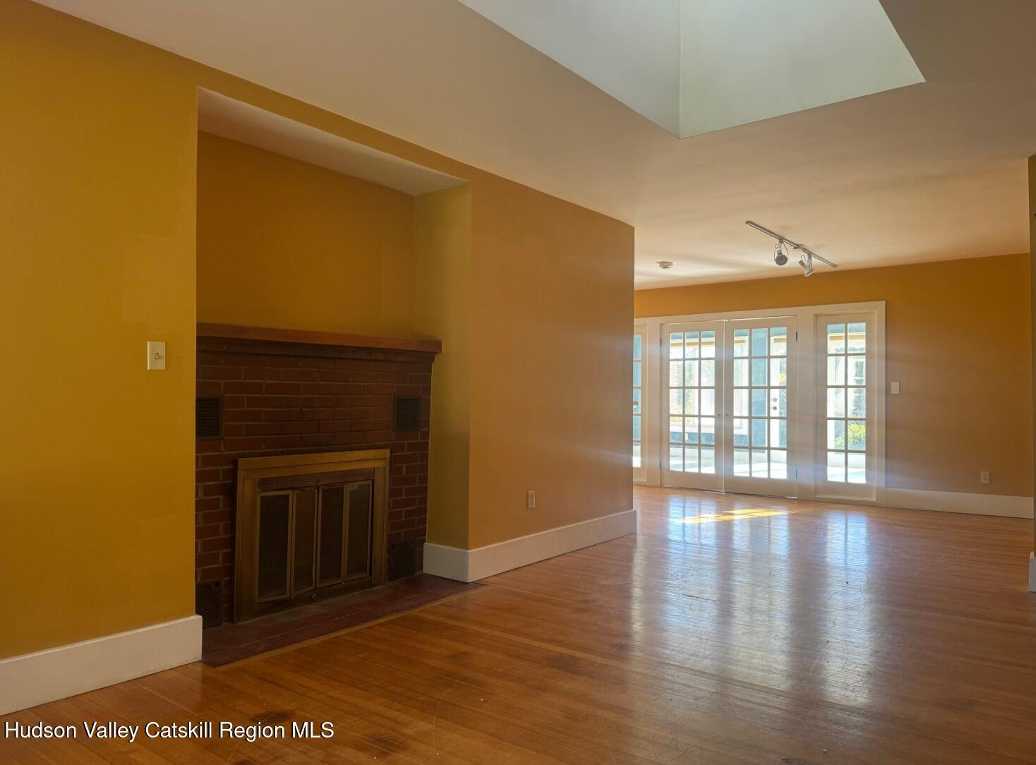 1476 County Rte 5 Canaan, NY 12029 - Photo 4 of 40 a view of an empty room with wooden floor and a window