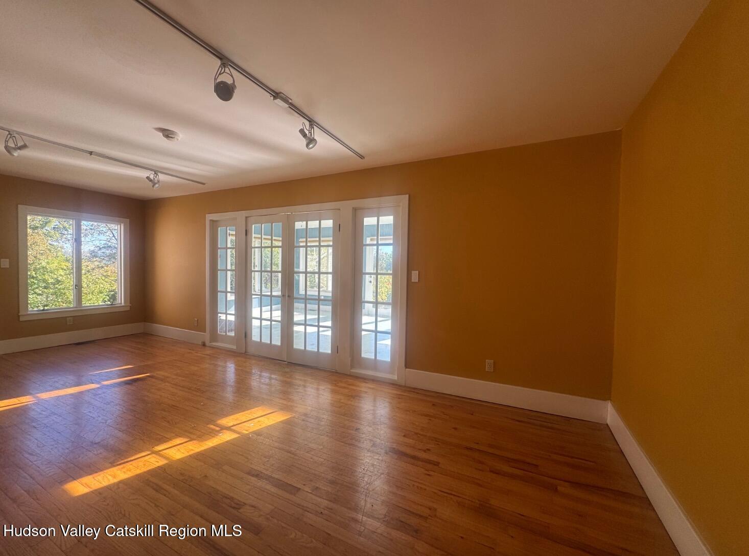 1476 County Rte 5 Canaan, NY 12029 - Photo 6 of 38 a view of an empty room with wooden floor and a window