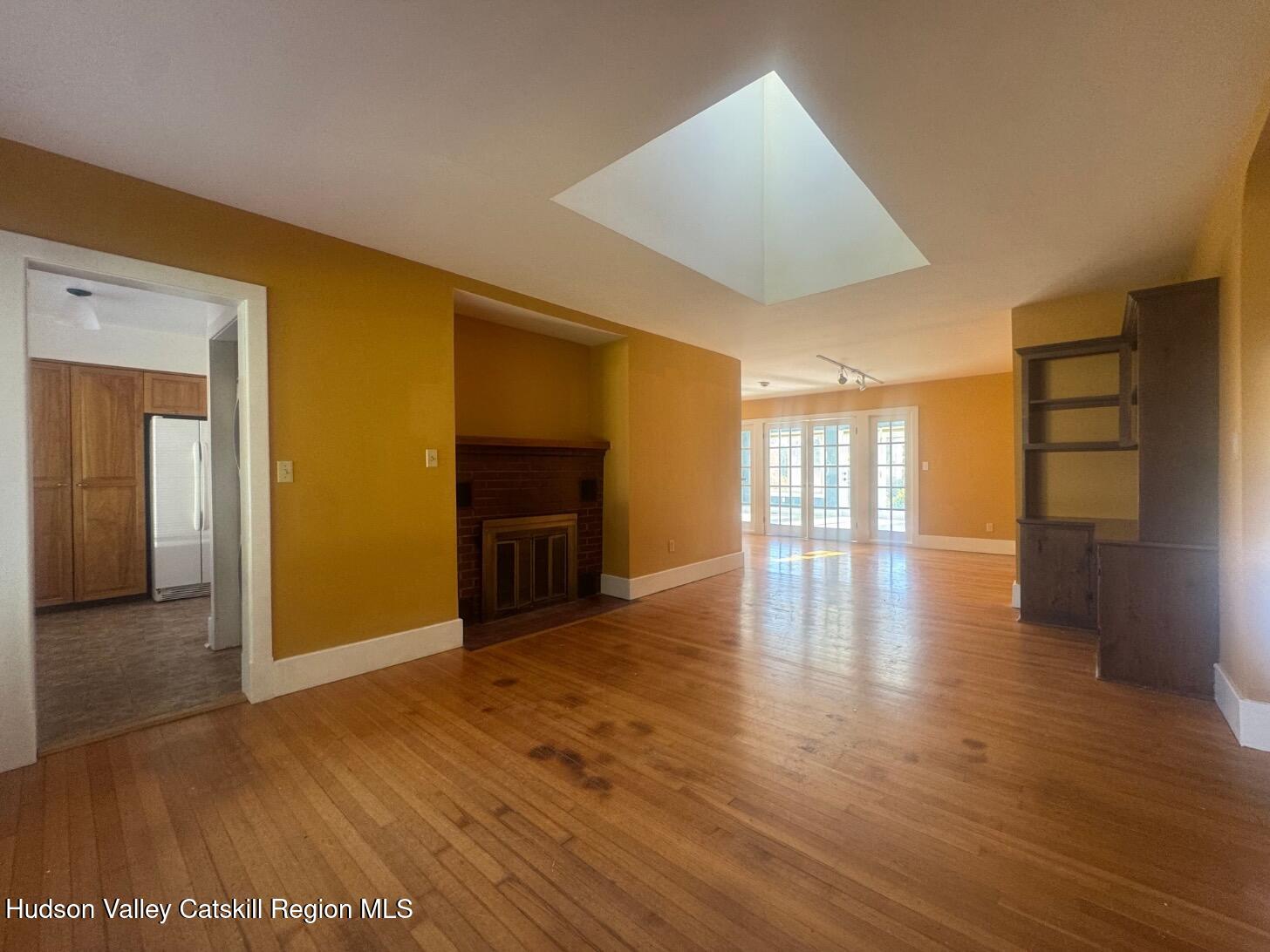 1476 County Rte 5 Canaan, NY 12029 - Photo 9 of 40 a view of an empty room with wooden floor and a window