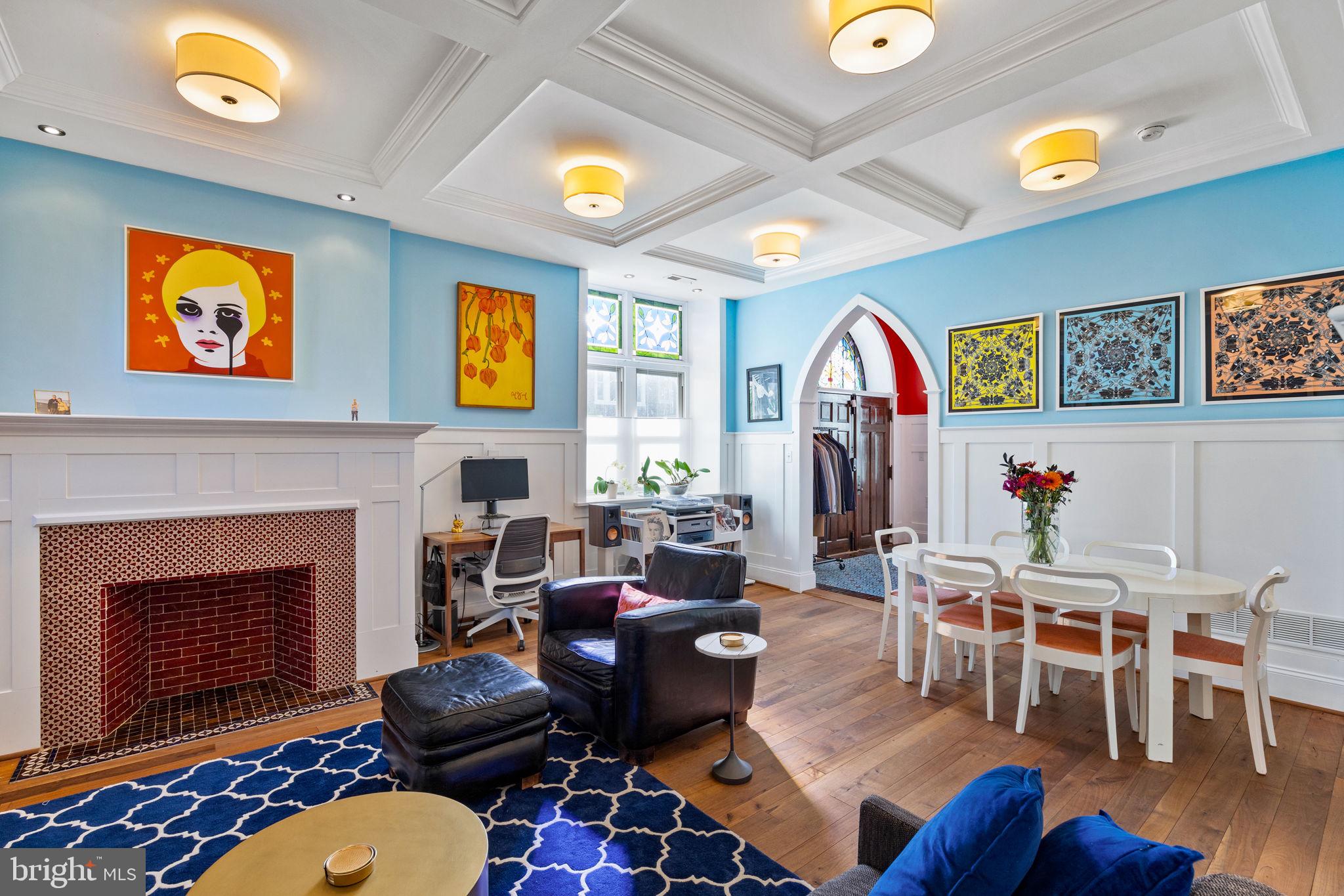 308 Monastery Avenue Philadelphia, PA 19128 - Photo 15 of 70 a living room with furniture fireplace and dining table