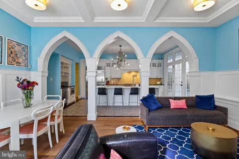 a kitchen with stainless steel appliances granite countertop a stove and a refrigerator