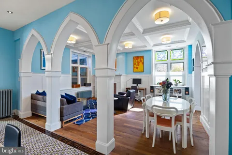 a kitchen with a stove and a sink