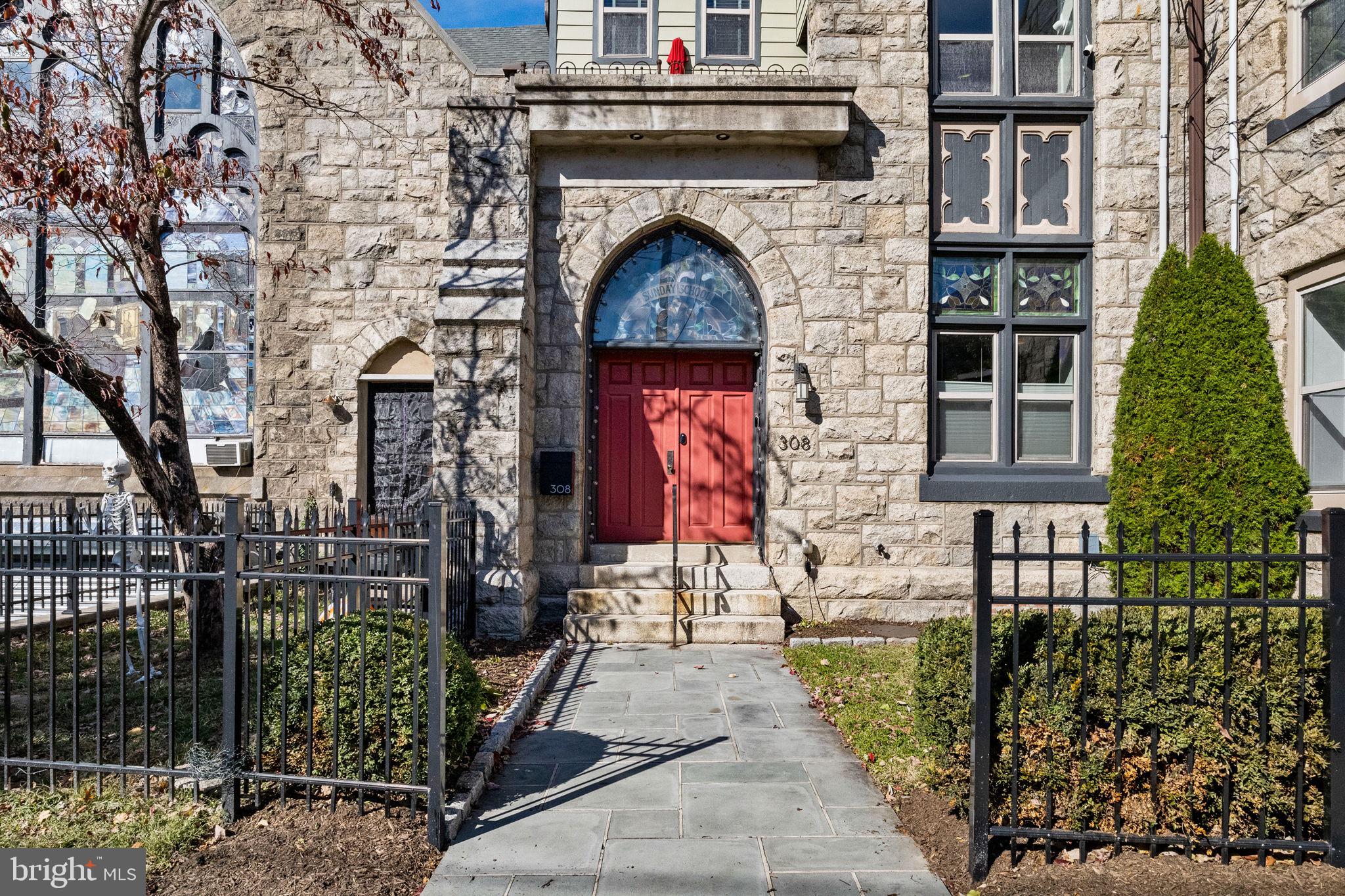 308 Monastery Avenue Philadelphia, PA 19128 - Photo 4 of 70 a front view of a house with a garden
