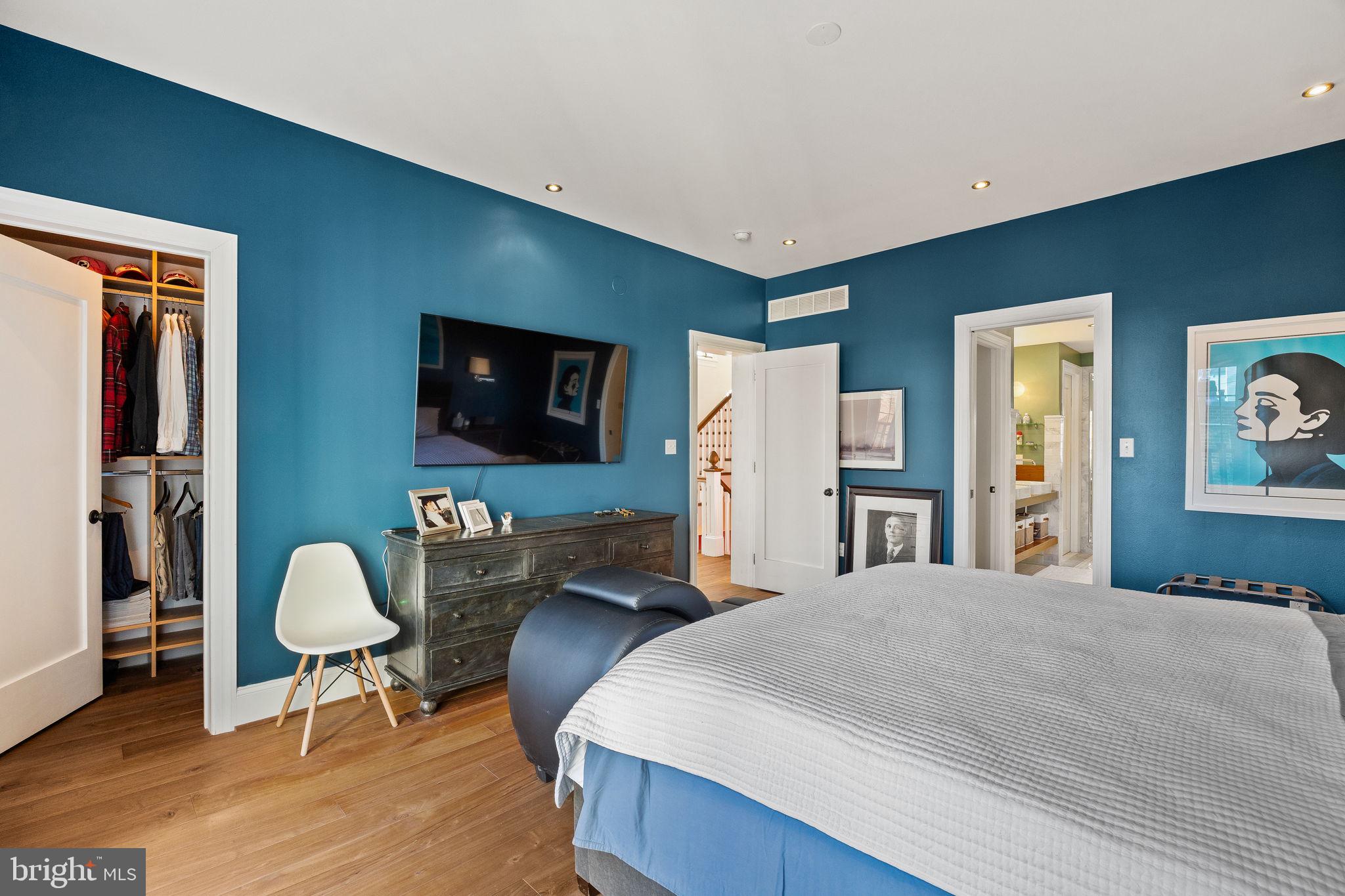 308 Monastery Avenue Philadelphia, PA 19128 - Photo 44 of 70 a bedroom with a bed and a chair