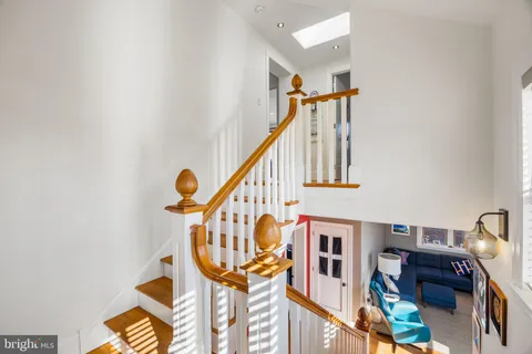 an aerial view of a residential apartment building with a yard