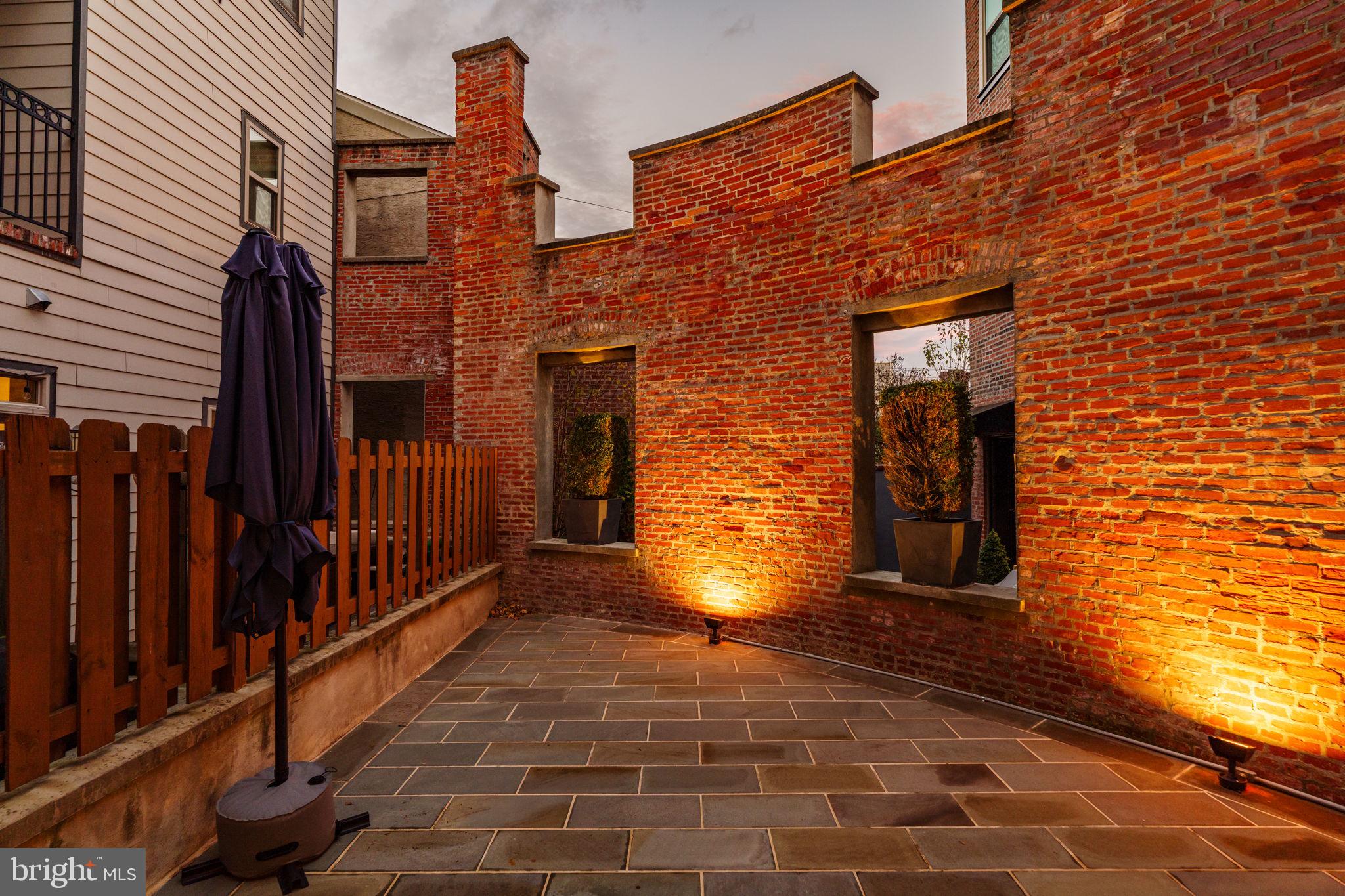 308 Monastery Avenue Philadelphia, PA 19128 - Photo 63 of 70 a view of a brick house with an empty space