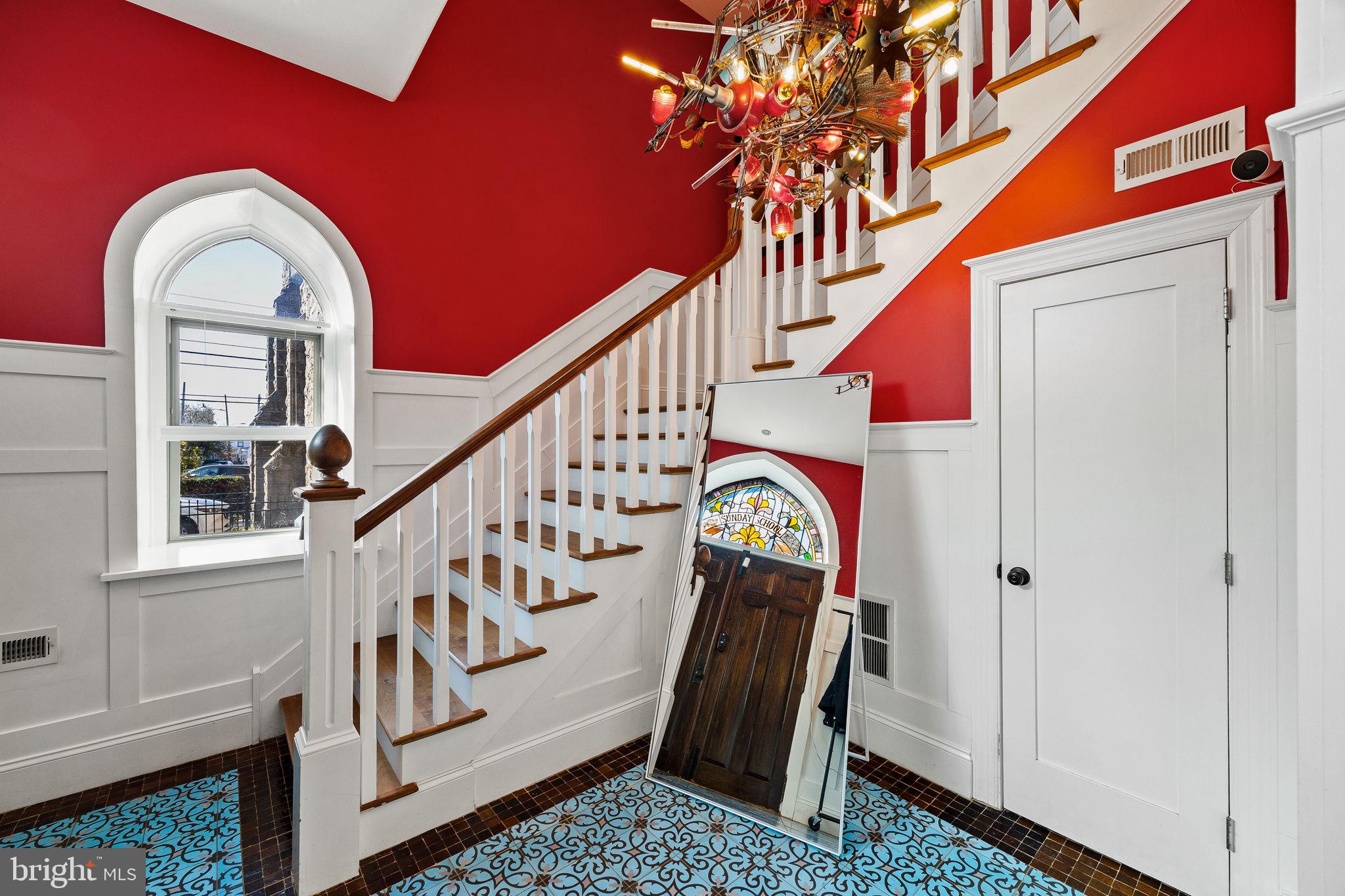 308 Monastery Avenue Philadelphia, PA 19128 - Photo 10 of 70 a view of entryway with wooden floor and stairs