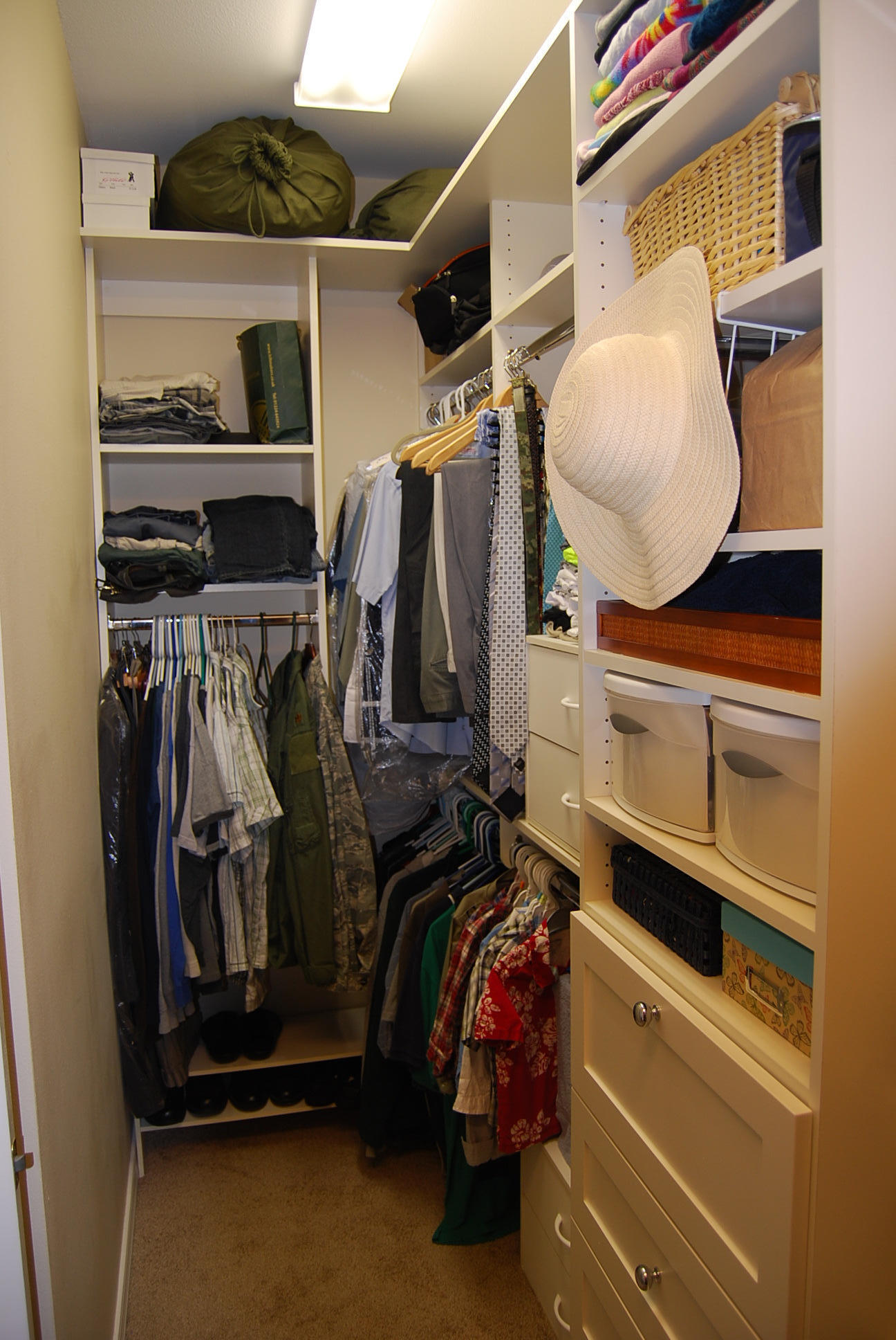 4461 Kingslynn Road Niceville, FL 32578 - Photo 18 of 38 a view of walk in closet with clothes and shoes