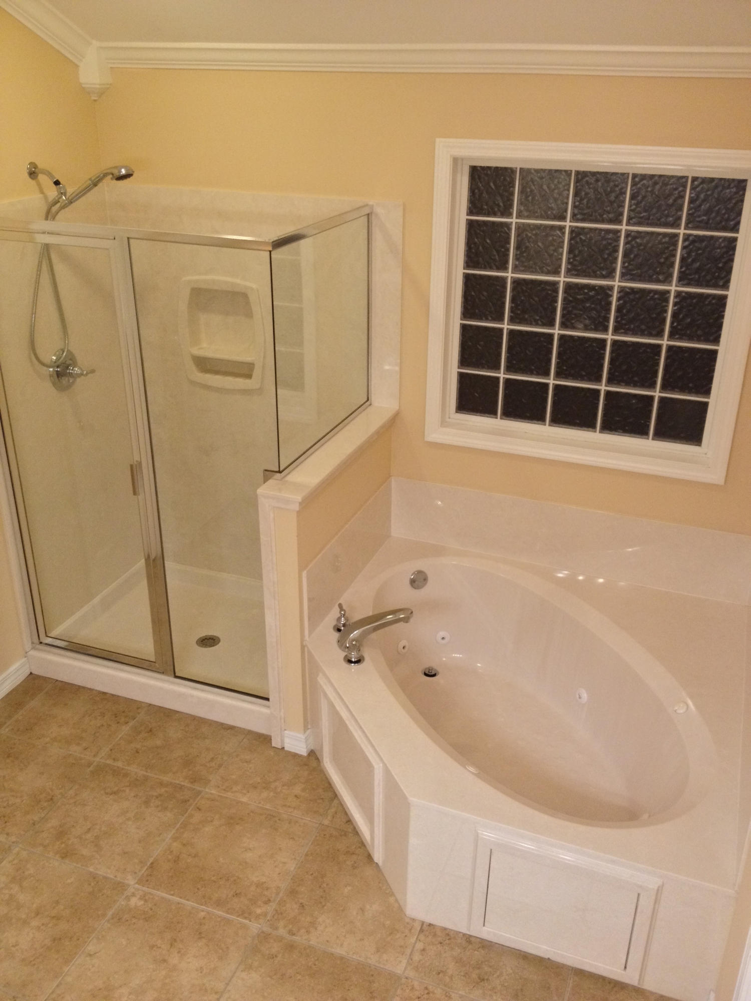 4461 Kingslynn Road Niceville, FL 32578 - Photo 20 of 38 a bathroom with a bathtub and a shower