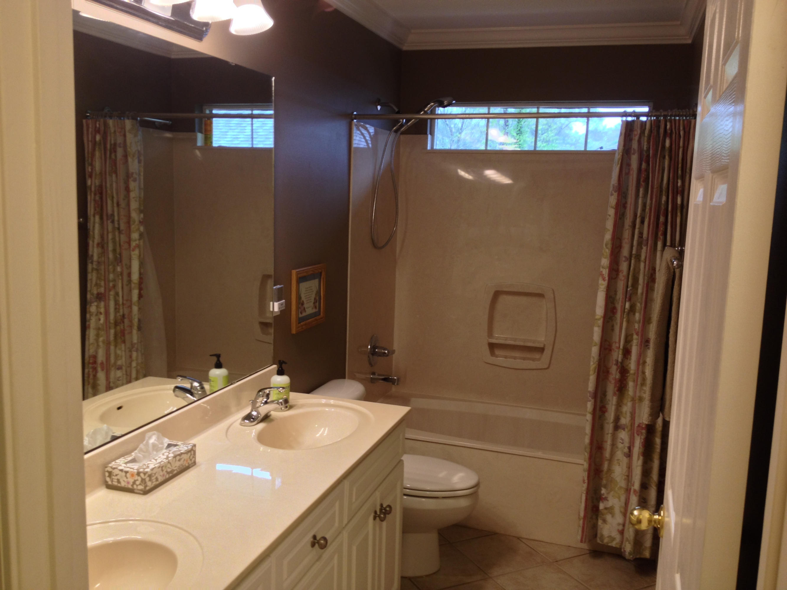 4461 Kingslynn Road Niceville, FL 32578 - Photo 24 of 38 a bathroom with a sink toilet and shower