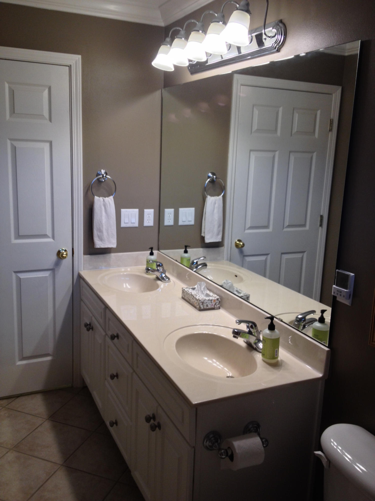 4461 Kingslynn Road Niceville, FL 32578 - Photo 25 of 38 a bathroom with a sink and a mirror