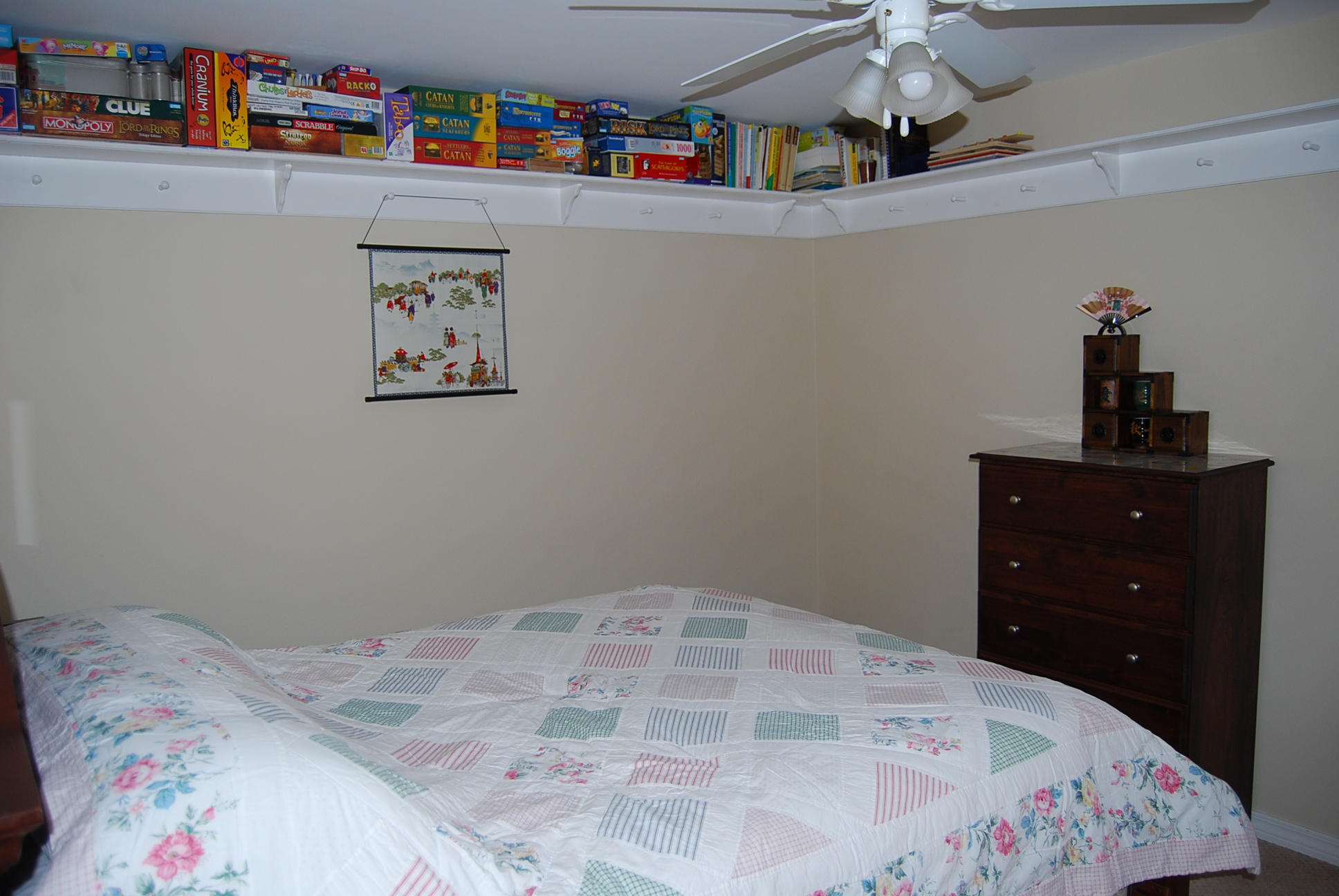 4461 Kingslynn Road Niceville, FL 32578 - Photo 26 of 38 a bedroom with a bed and a dresser