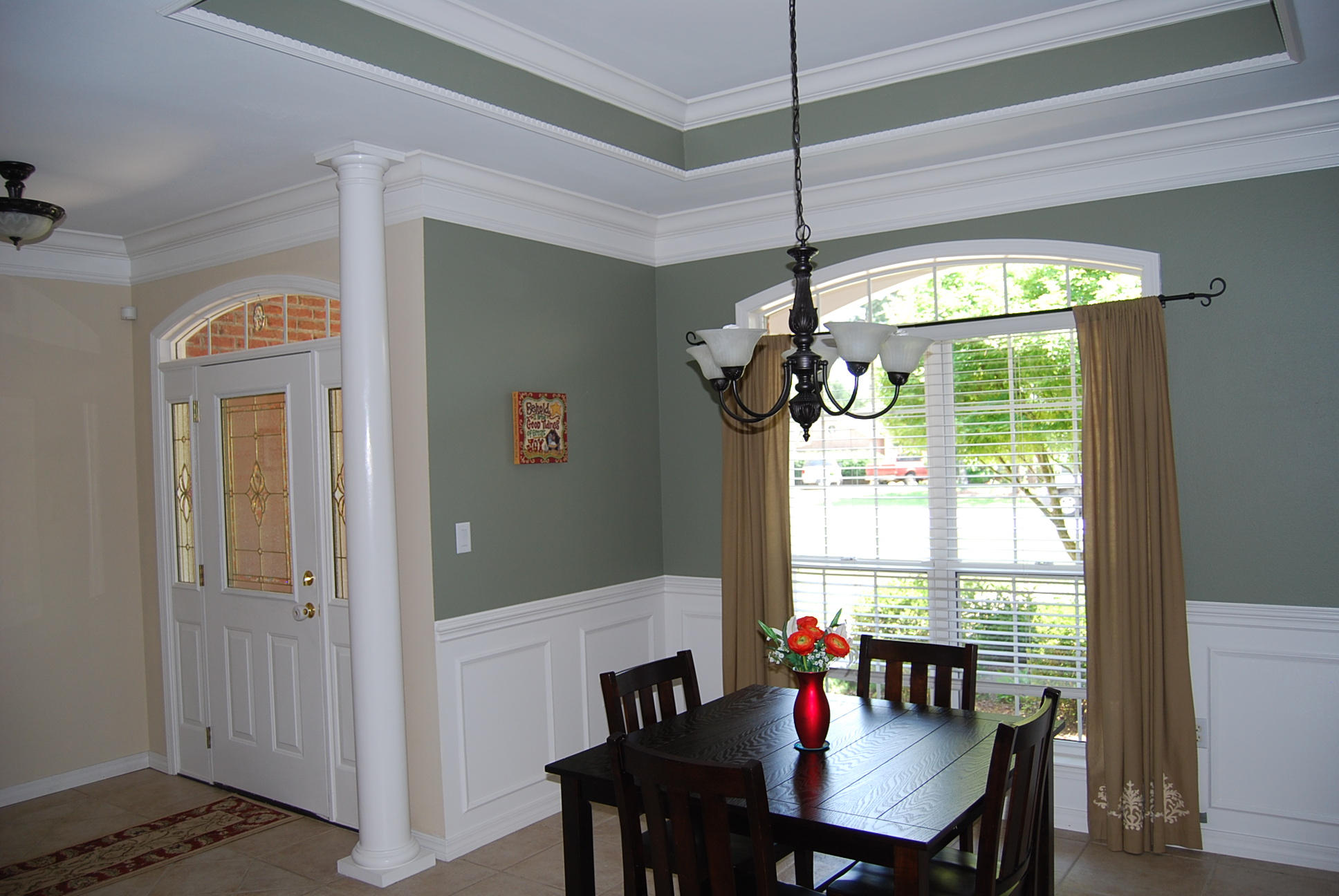 4461 Kingslynn Road Niceville, FL 32578 - Photo 4 of 38 a dining room with furniture a chandelier and window