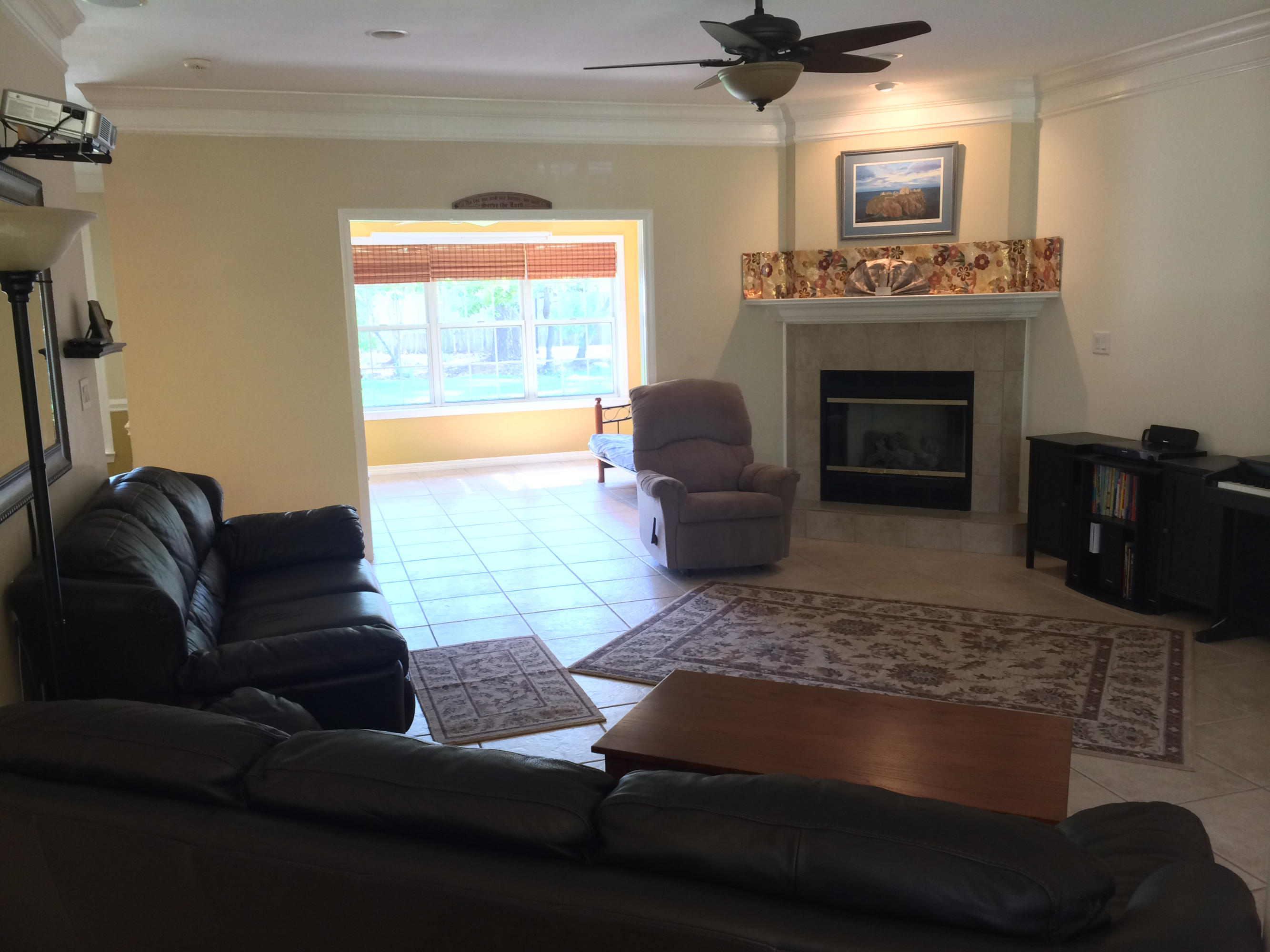 4461 Kingslynn Road Niceville, FL 32578 - Photo 5 of 38 a living room with furniture and a fireplace