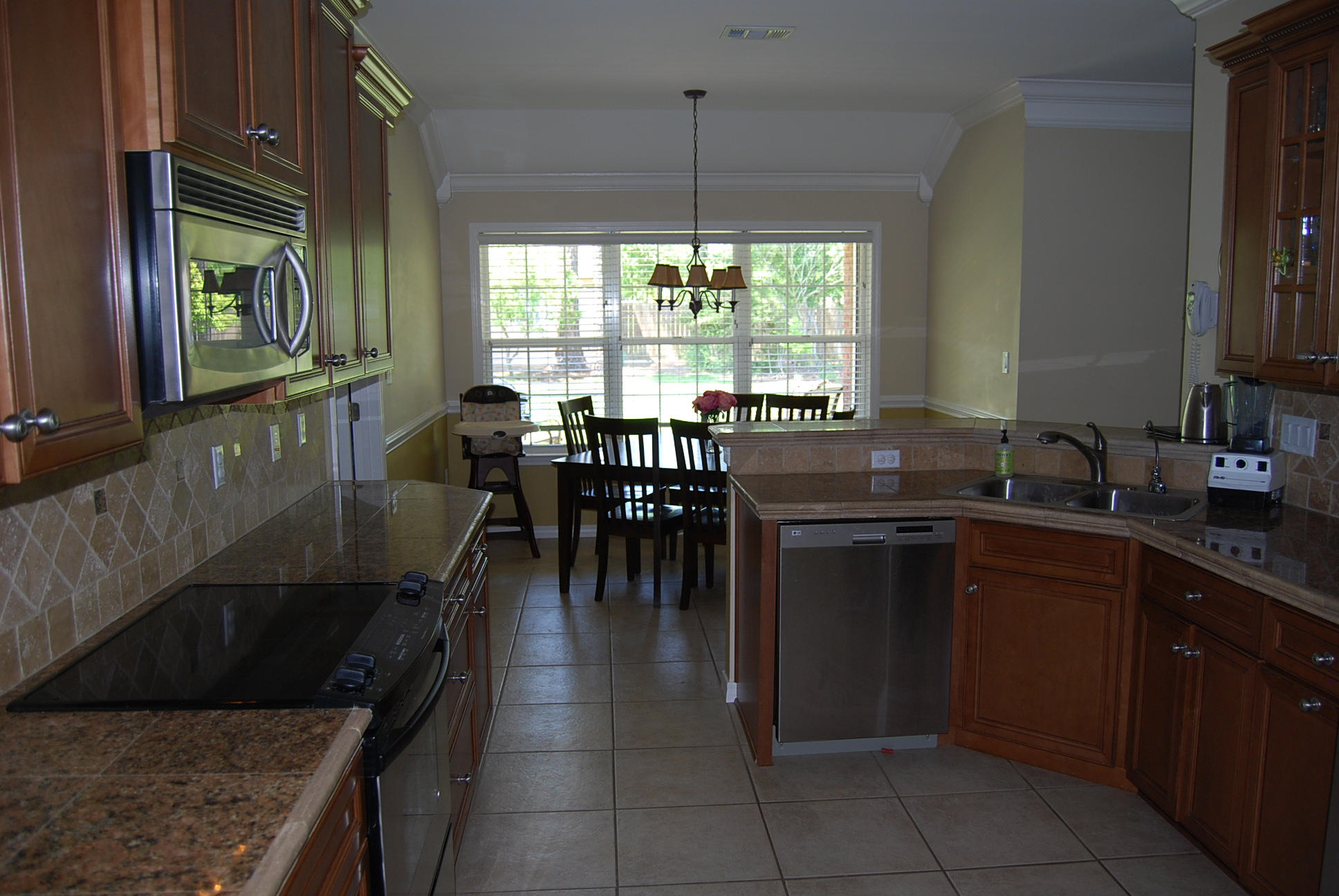 4461 Kingslynn Road Niceville, FL 32578 - Photo 7 of 38 a kitchen with a large counter top space