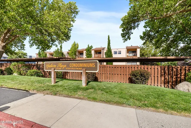 a view of a deck with a small yard