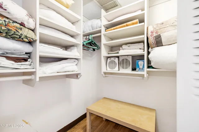 a view of a room with racks on the wall