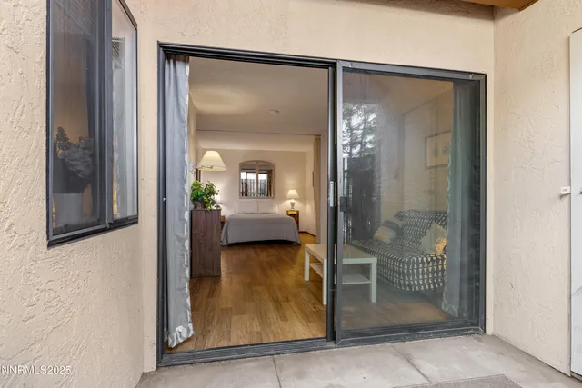a view of a bathroom from a hallway