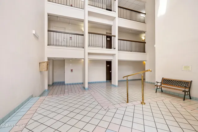 a view of empty room with windows