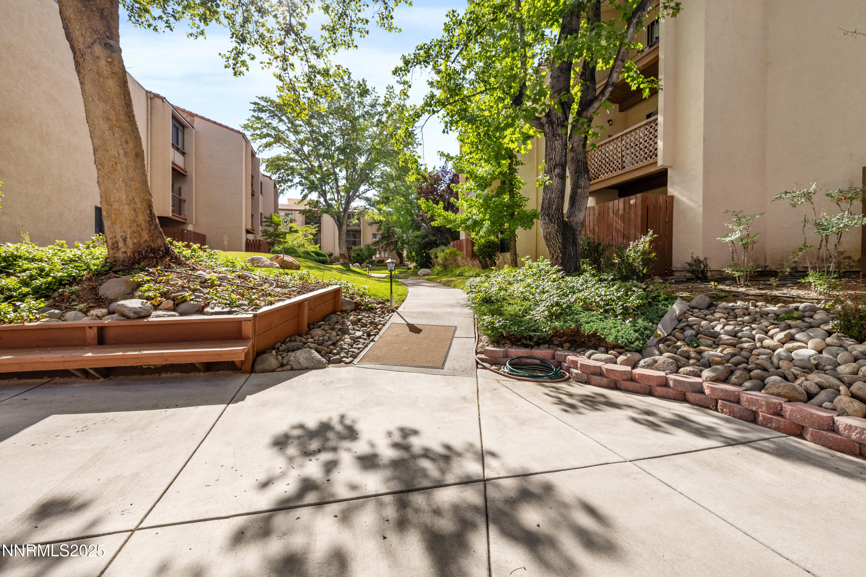 2750 Plumas Street, Unit 109 Reno, NV 89509 - Photo 18 of 19 a view of a backyard with chairs and plants