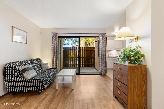 a living room with furniture and a gate