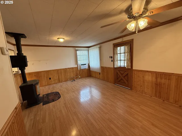 a bedroom with furniture and window