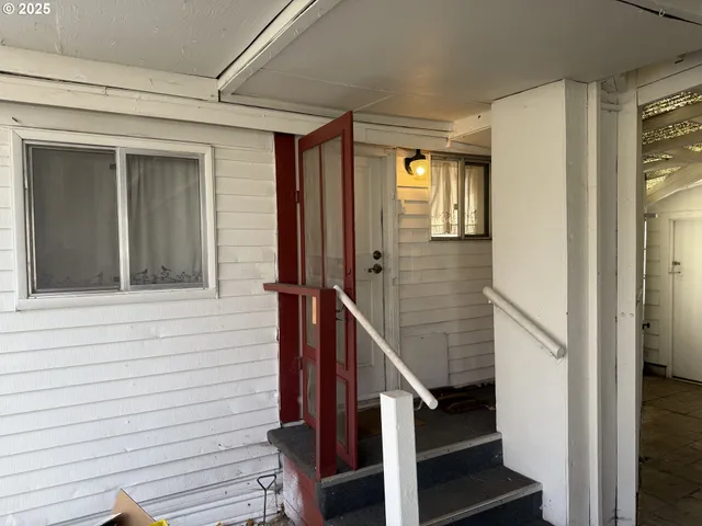 a view of room with gym equipment