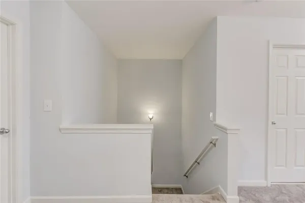 a view of hallway with stairs