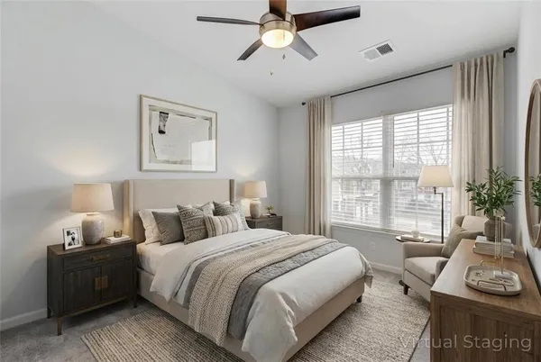 an empty room with fan