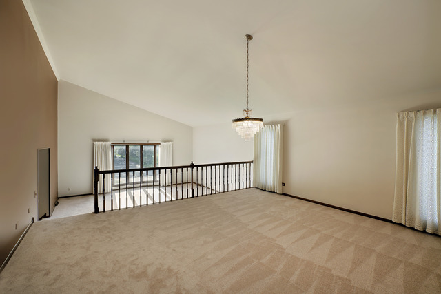 3915 Rugen Road Glenview, IL 60025 - Photo 2 of 11 a view of empty room with windows