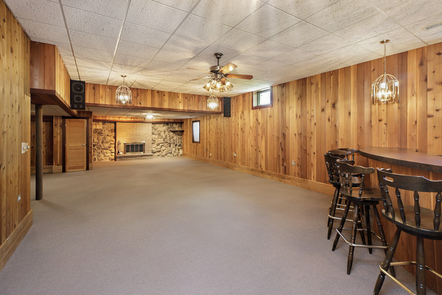 3915 Rugen Road Glenview, IL 60025 - Photo 8 of 11 a view of a livingroom with furniture and a chandelier