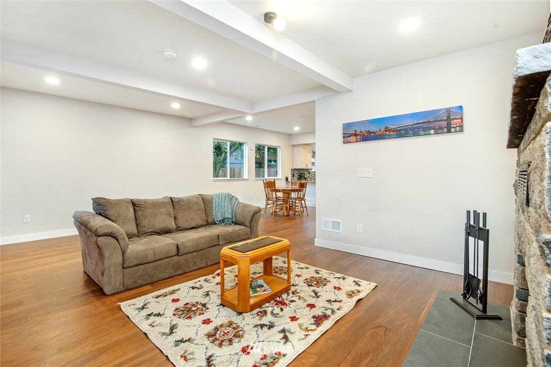 2317 Rucker Avenue Everett, WA 98201 - Photo 5 of 25 a living room with furniture and a rug