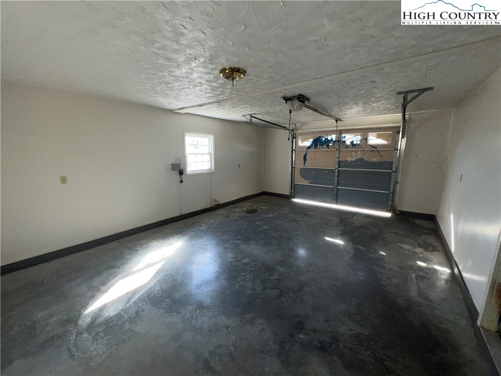 355 Round Knob Church Road West Jefferson, NC 28694 - Photo 15 of 23 a view of a garage