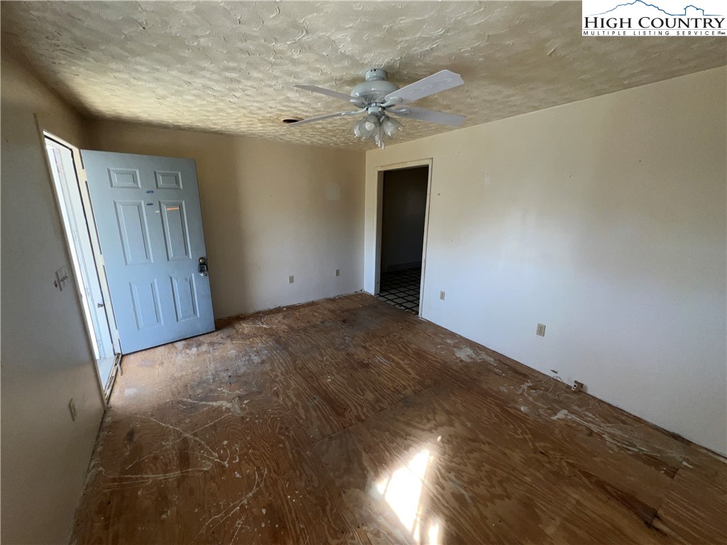 355 Round Knob Church Road West Jefferson, NC 28694 - Photo 4 of 23 a view of empty room