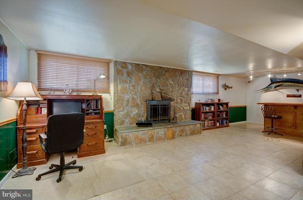 8011 Langbrook Road Springfield, VA 22152 - Photo 20 of 30 a view of a livingroom with furniture and a fireplace
