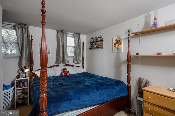 8011 Langbrook Road Springfield, VA 22152 - Photo 26 of 30 a bed room with a bed and a window