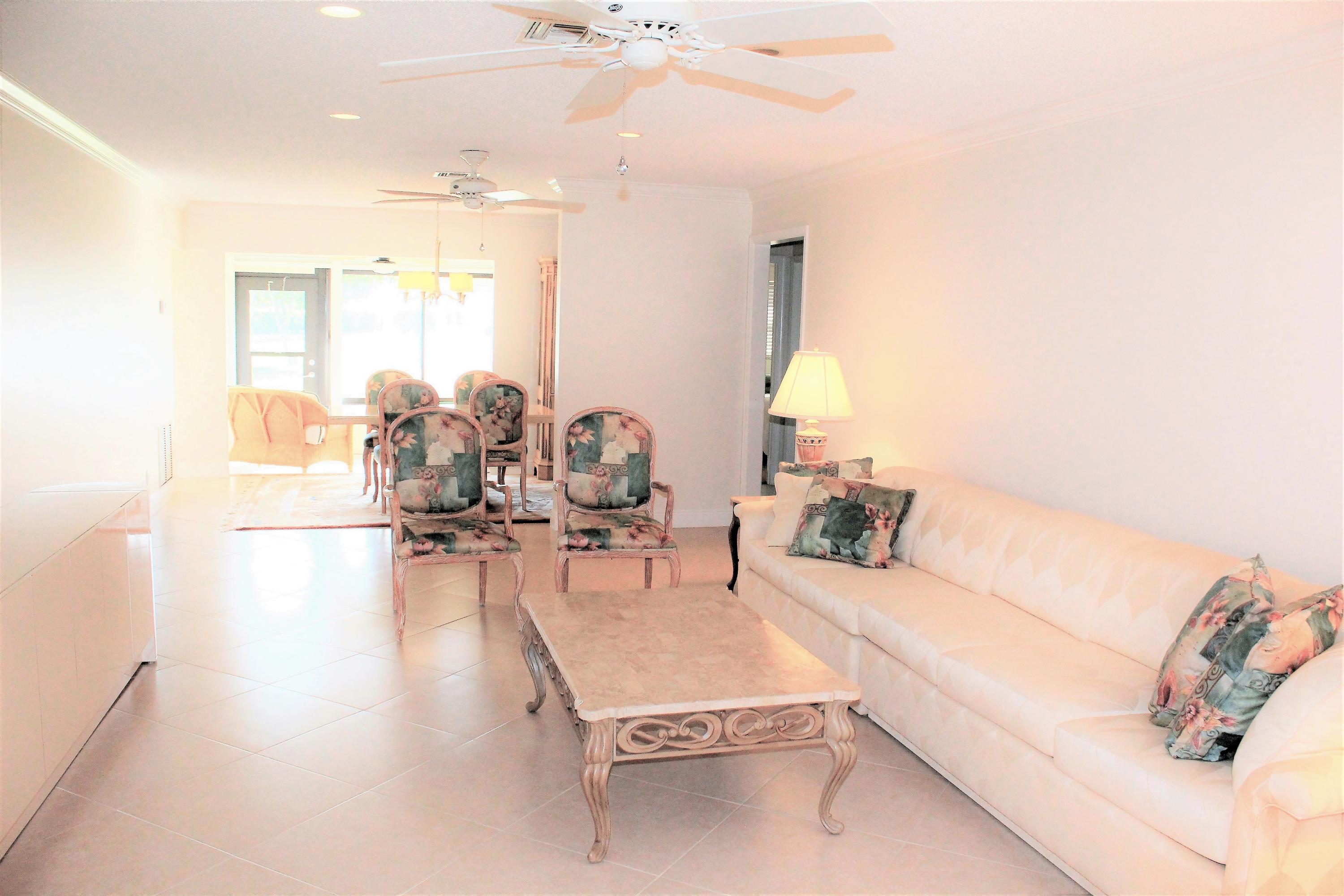 4595 Laurel Tree Road, Unit B Boynton Beach, FL 33436 - Photo 7 of 31 Living Room to Dining Room