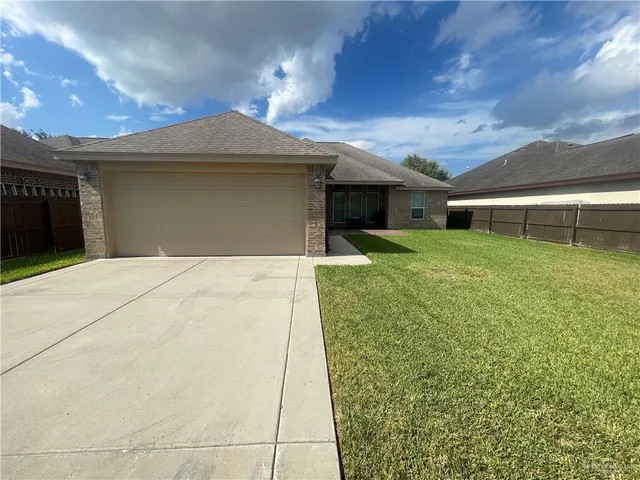 a view of a backyard with plants