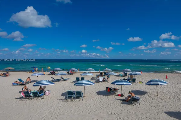 a view of a terrace with furniture