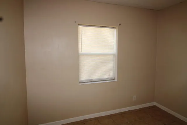 an empty room with a window