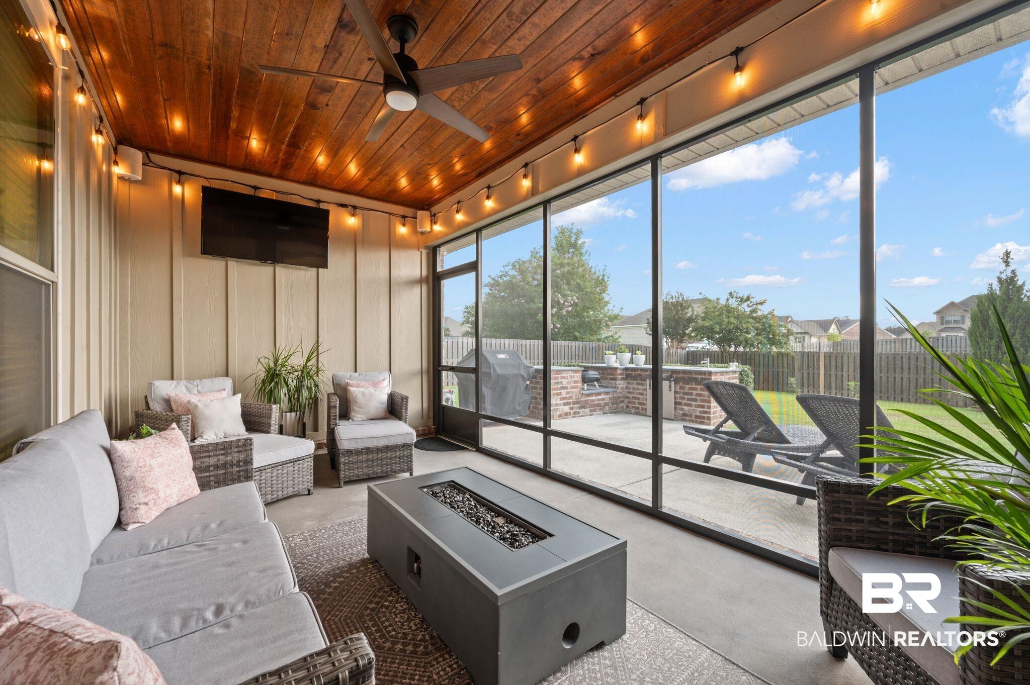 418 Fortune Drive Fairhope, AL 36532 - Photo 50 of 63 Sunroom / solarium with ceiling fan, rail lighting, and wooden ceiling