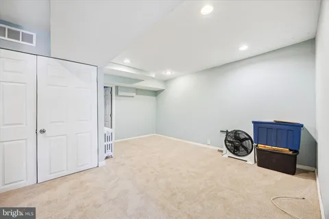 a view of a livingroom with storage