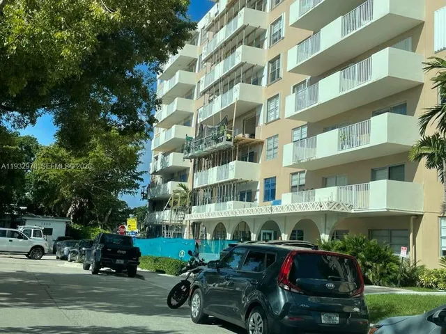 a car parked in front of a building